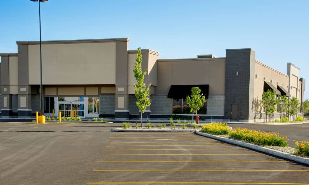commercial property site alta survey - ALTA SURVEY Tampa A vacant commercial property site with parking area and building, representing a typical subject for an ALTA land title survey.